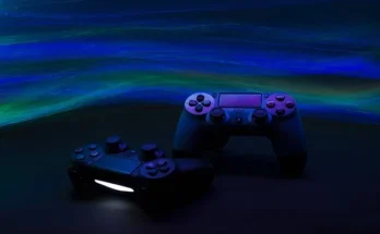 A Blooket Join controller positioned next to another similar controller on a flat surface.