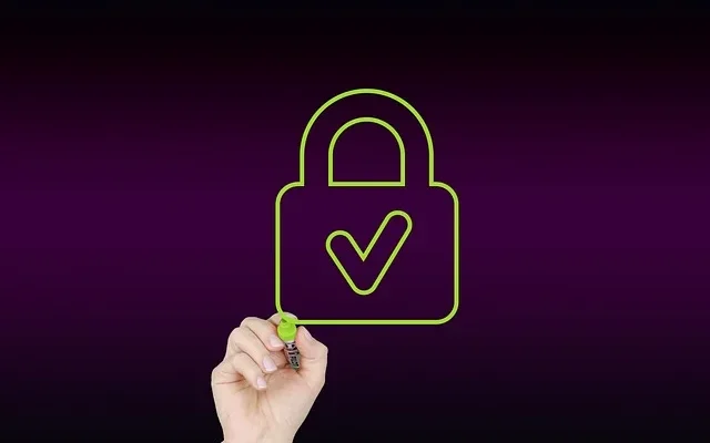 A hand sketches a padlock on a vibrant purple background, representing security and privacy for anonvault.