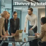 Business professionals collaborating in an office setting, representing Thrivve by Intelletec.